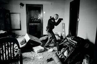 att8cf19 Photo credit: World Press Photo of the Year 2008, Anthony Suau, USA, for Time